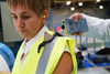 h&s officer measuring noise exposure with pulsar dosebadge reader