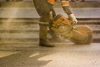 STOCK rod worker using grinder HAVS