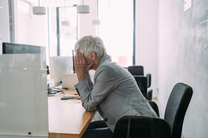 iStock-mature-lady-office-menopause-1406122870.jpg